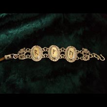 Amulets and Charms - Runes Bracelet Gold - Click here for more info